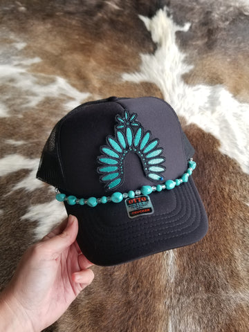 Turquoise squash trucker hat