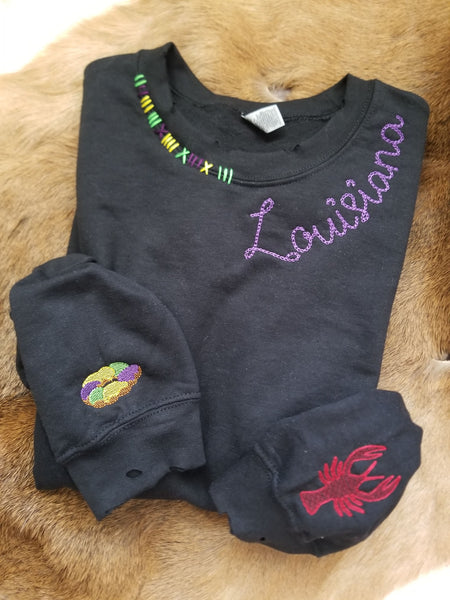 Louisiana distressed embroidered king cake and crawfish sweatshirt