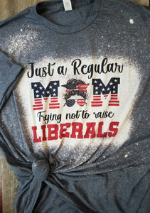 Just a mom trying not to raise liberals navy bleached tee